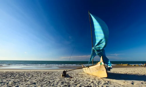 Dhow on wide Mozambique beach