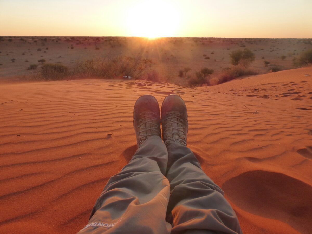 picture of legs in namibia desert during sunset