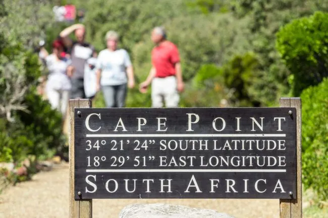 Cape Point sign in front of tourists
