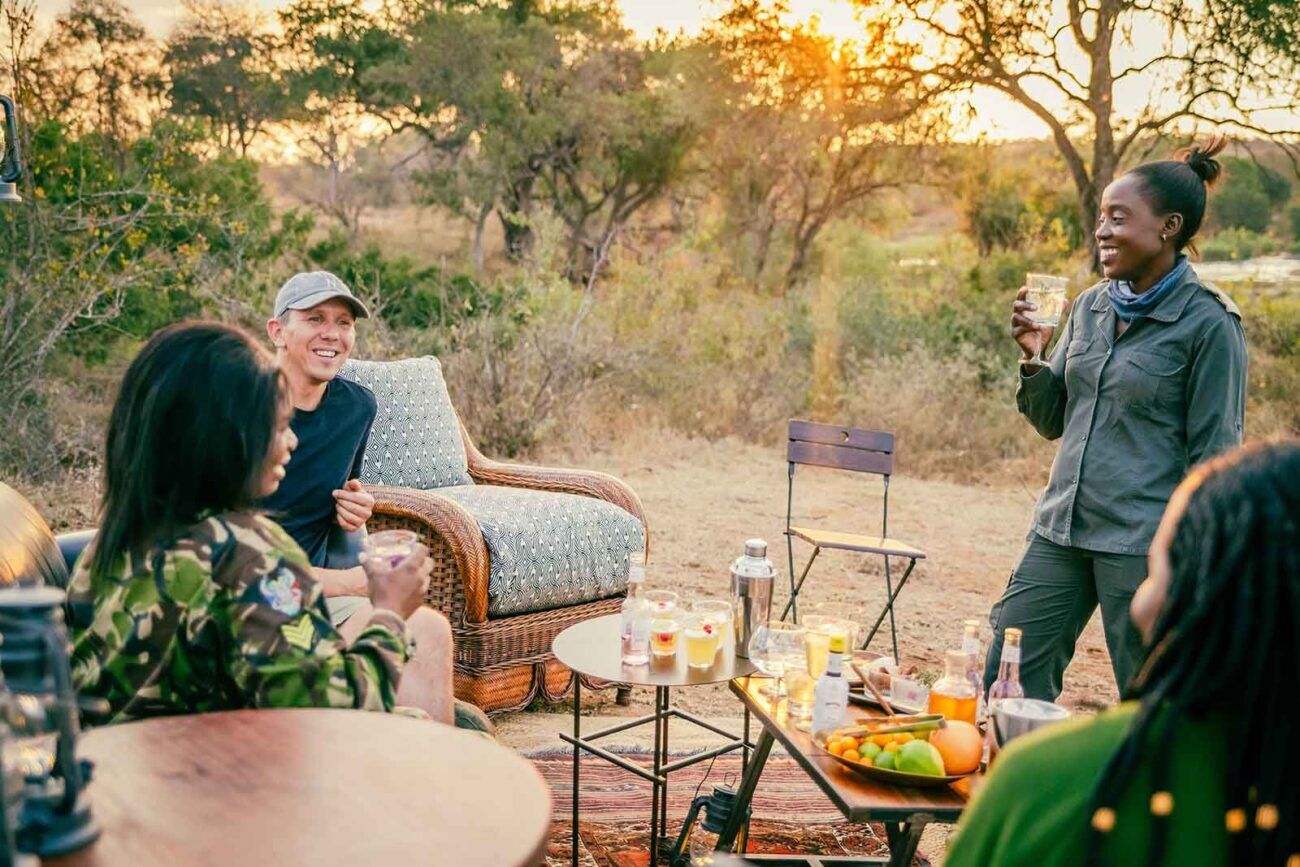 people enjoying a drink while out on a safari tour