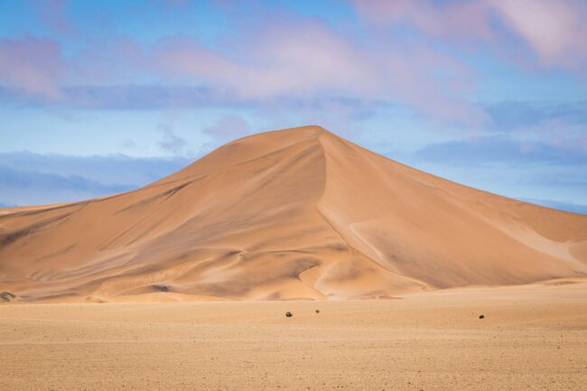 Pastel sky and soft sand dunes of Sossusvlei Namibia