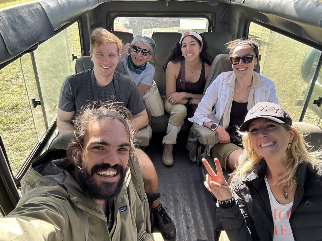 tour group sitting inside a safari vehicle