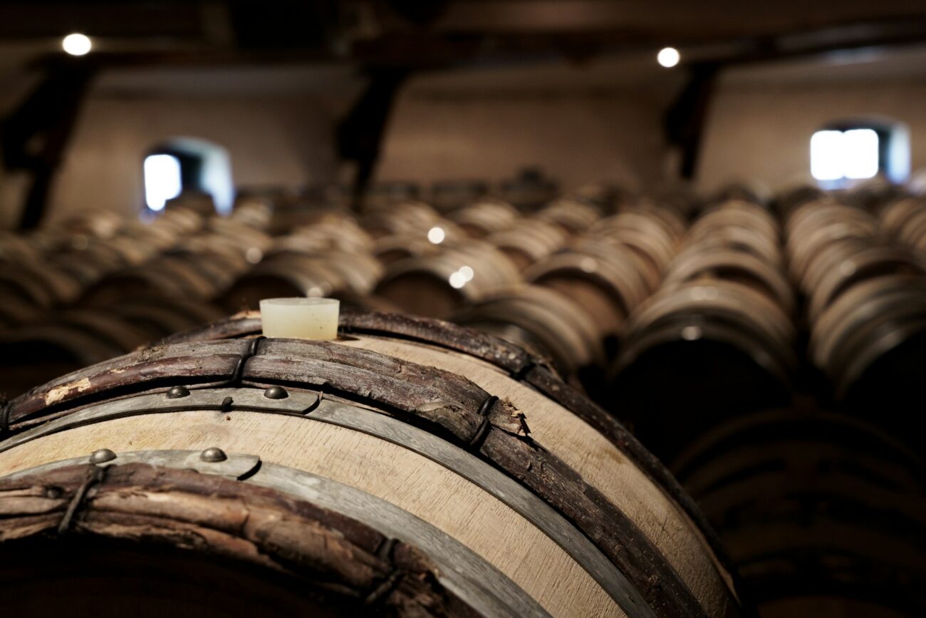 close up of a wine barrel in a cellar