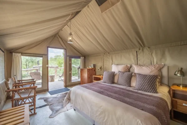 Interior of luxury tent accommodation on family safari Kruger