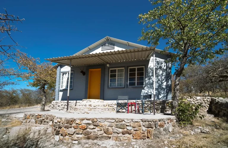 picture showing the front of chalet at etosha safari camp