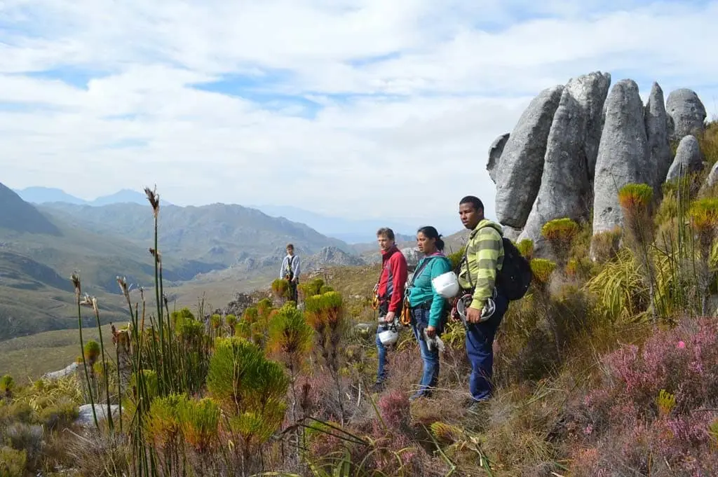 Group takes guided walk in mountains on the Cape Canopy Tour